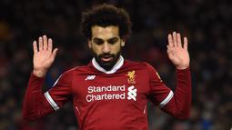 Mohamed Salah - Salah merupakan bintang sepak bola muslim yang dikenal taat dan rajin menjalankan ibadah puasa selama Ramadan. Bahkan Salah tetap menjalankan ibadah puasa saat tampil final Liga Champions 2018/19. (AFP/Paul Ellis)