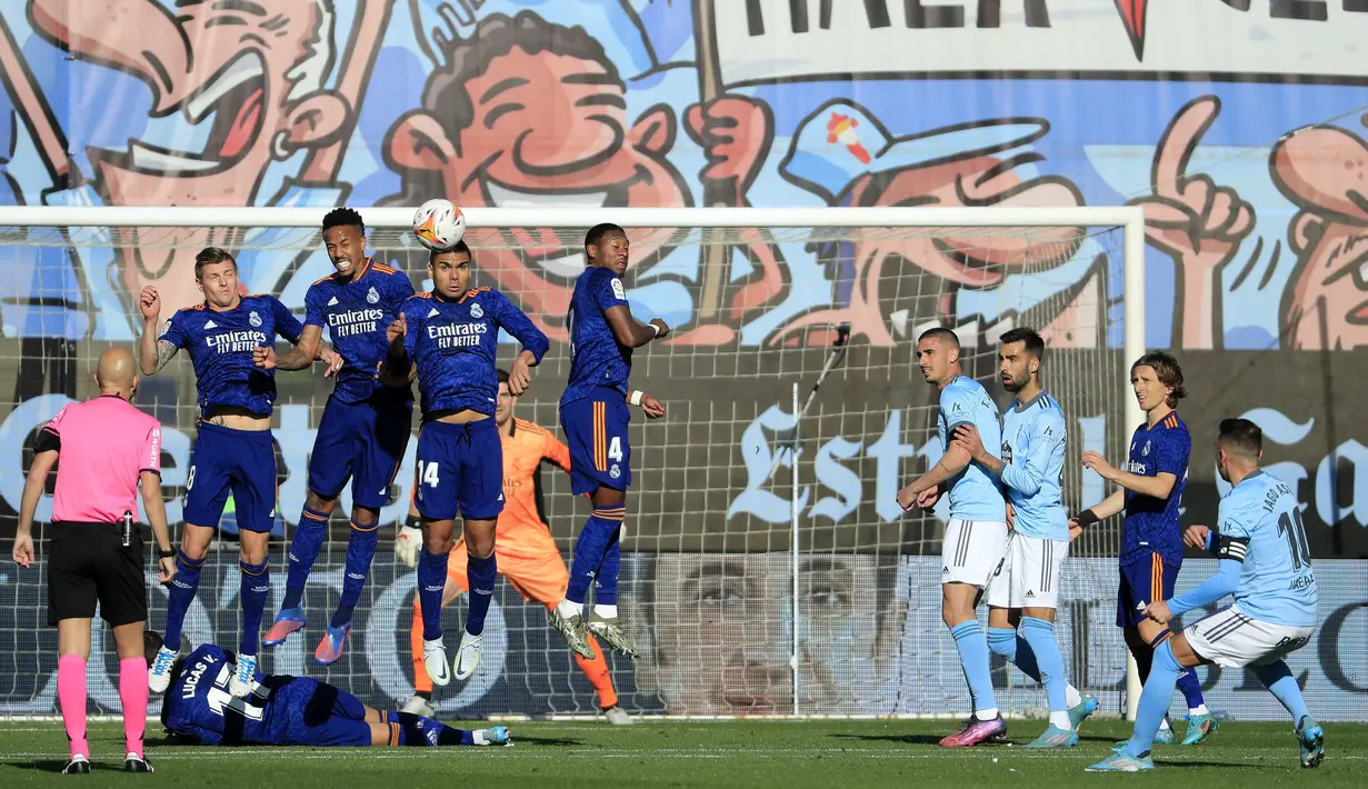 Berkat hasil ini, Real Madrid masih kukuh di puncak klasemen La Liga dengan 69 poin dari 30 laga. Adapun Celta Vigo menghuni peringkat ke-11 dengan 36 poin. (AP/Lalo R. Villar)