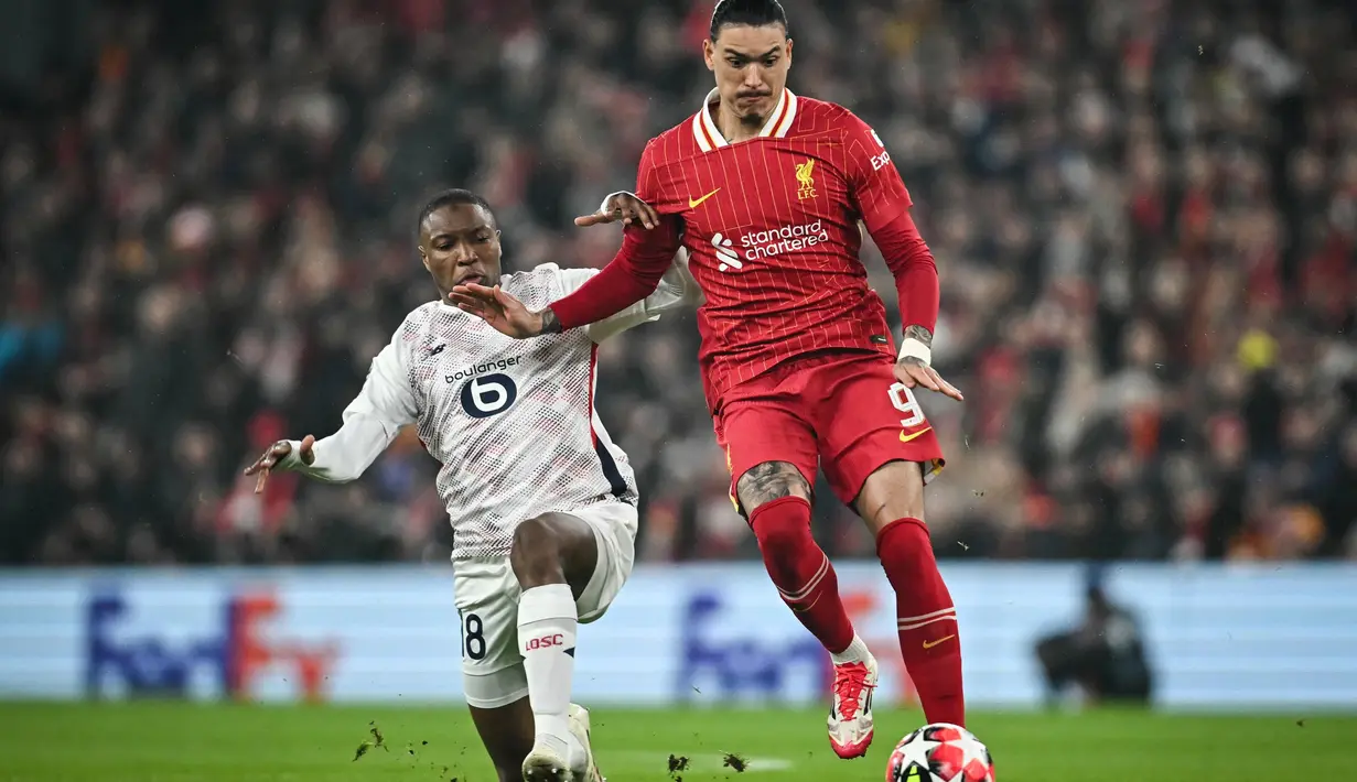 Bermain kandang, Liverpool mendominasi pertandingan sejak menit awal. (Paul ELLIS/AFP)