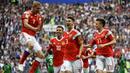 Gelandang Rusia, Yuri Gazinskiy, merayakan gol ke gawang Arab Saudi pada laga Grup A Piala Dunia di Stadion Luzhniki, Moskow, Kamis (15/6/2018). Dirinya merupakan pencetak gol perdana pada Piala Dunia 2018. (AFP/Alexander Nemenov)