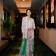 Kebaya encim bordir bunga kecil dijadikan Laura Basuki sebagai outer untuk tank top putih. @laurabas.