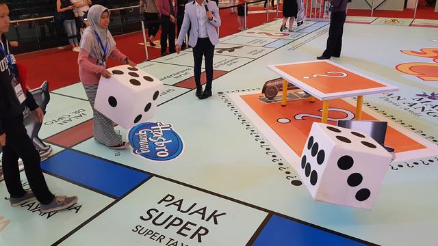 Taman Bermain Monopoli Memberi Hadiah Emas Satu Kilogram Untuk Yang Beruntung