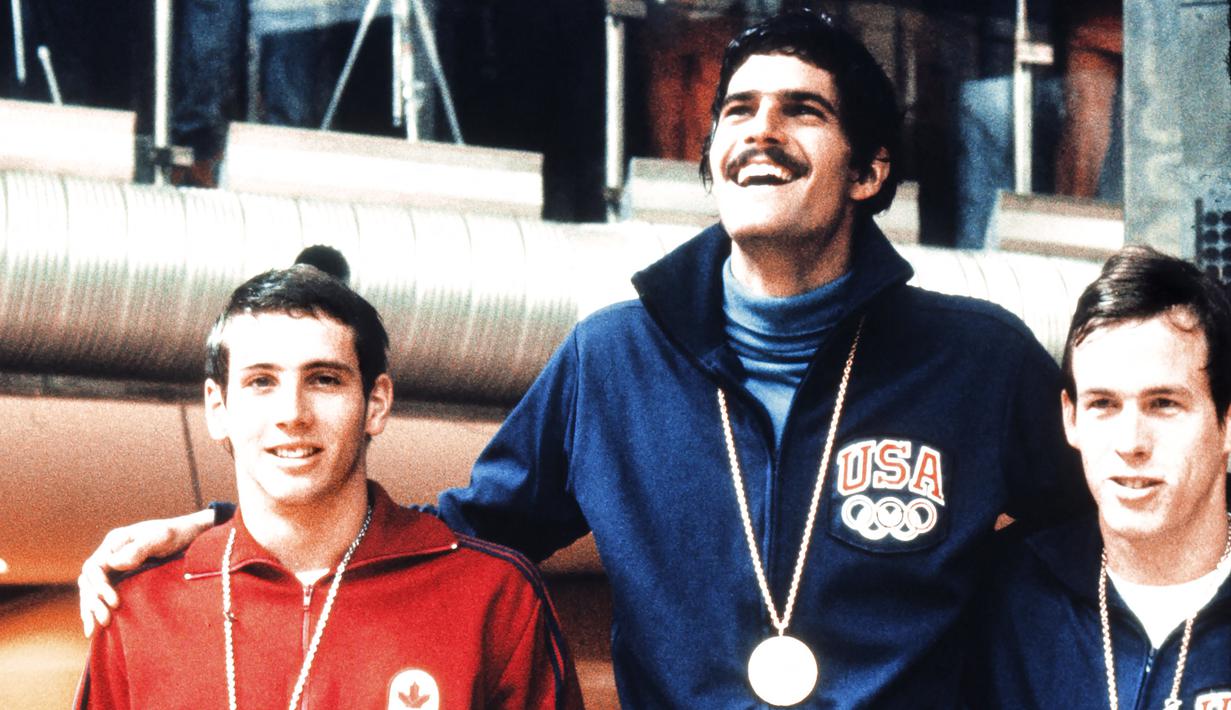 Delapan medali emas Michael Phelps pada Olimpiade Beijing 2008 sekaligus juga memecahkan rekor 7 medali emas Mark Spitz yang bertahan 46 tahun, yang dibuatnya pada Olimpiade Munich 1972. (Foto: EPU/AFP)