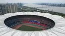 Foto udara pada 1 April 2022 menunjukkan Stadion Pusat Olahraga Olimpiade Hangzhou, stadion utama Asian Games ke-19, di Hangzhou di provinsi Zhejiang timur China. Asian Games ke-19 Hangzhou 2022 rencananya digelar pada 10-25 September 2022. (STR / AFP)