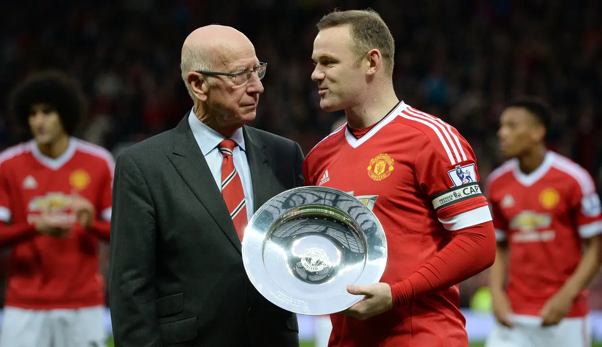Wayne Rooney. Manchester United mengikatnya dari Everton di deadline day musim panas 2004/2005, 31 Agustus 2004. Selama 13 musim, Wayne Rooney tampil dalam 559 laga dengan mencetak 253 gol yang menjadikannya sebagai pencetak gol terbanyak Setan Merah sepanjang masa. (Foto: AFP/Oli Scarff)