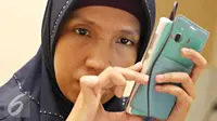 Penyandang tunanetra mengakses internet dalam acara Sosialisasi Pelatihan Internet Tunanetra di Rumah Internet Atmanto, Jakarta, Selasa (5/4). Diharapkan penyandang disabilitas dapat memperoleh akses terhadap teknologi. (Liputan6.com/Immanuel Antonius)