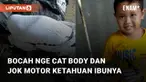 Aksi polos seorang bocah nge cat body motor dan jok motor mengundang perhatian