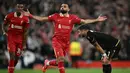 Mohamed Salah pada menit ke-75 berhasil menambah keunggulan Liverpool. Kemenangan atas atas Bologna mengantar Liverpool bertengger di lima besar klasemen Liga Champions 2024/2025. (Paul ELLIS/AFP)