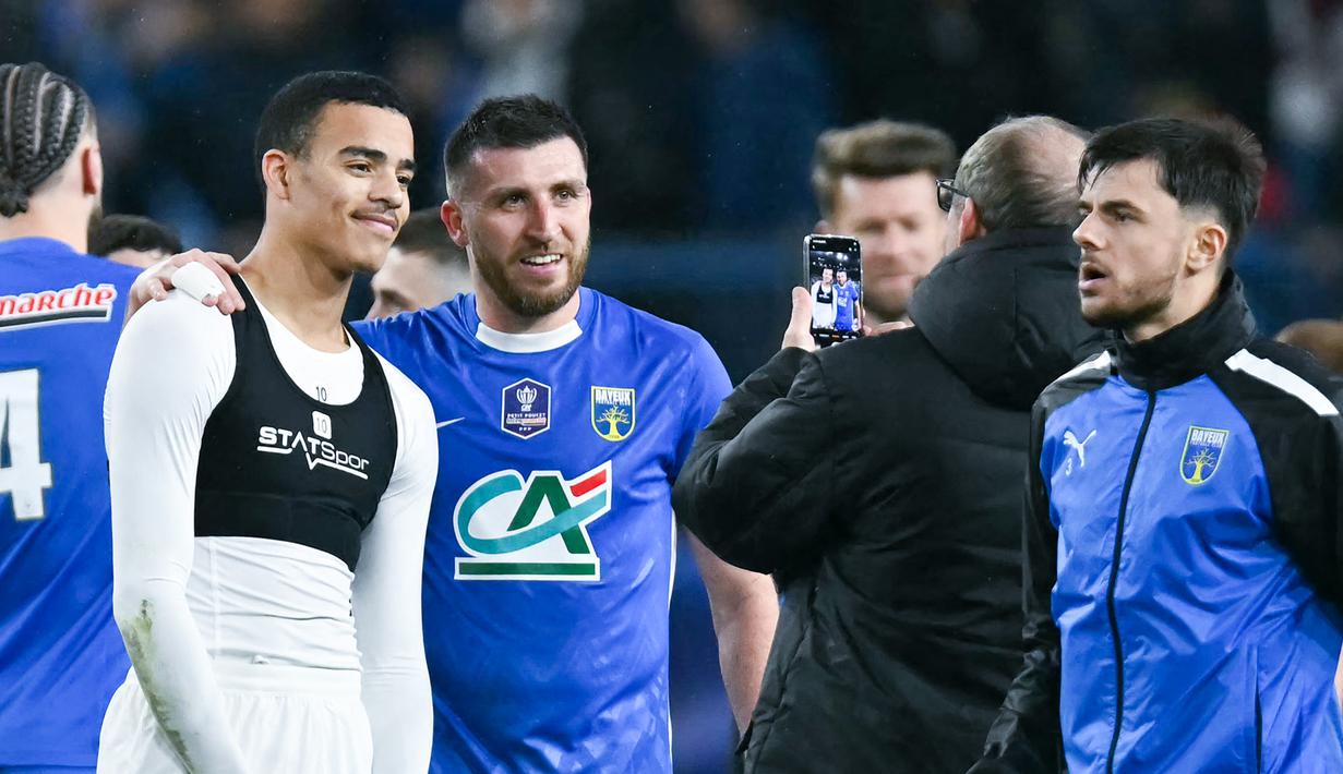 Greenwood terus menunjukkan performa tajam sepanjang musim ini. Tambahan tiga gol membuat koleksi golnya menjadi 19 gol di semua kompetisi. (AFP/Lou Benoist)