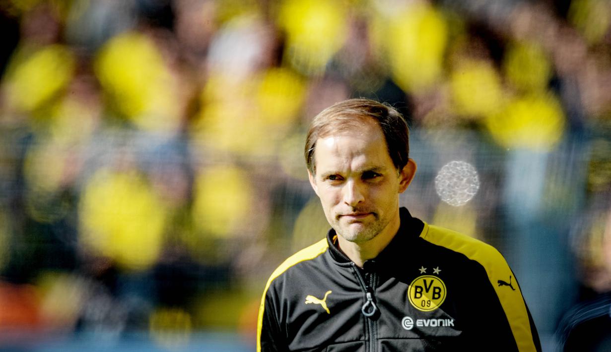 1. Thomas Tuchel - Pria asal Jerman ini mulai tenar ketika membawa FC Mainz 05 dan Borussia Dortmund tampil apik di Bundesliga. Karena konflik dengan petinggi Die Borussen, akhirnya ia memilih pergi dari Signal Iduna Park. (AFP/Sascha Schuermann)