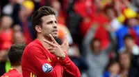 Gerard Pique telah meraih gelar juara Piala Dunia 2010 dan Piala Eropa 2012 bersama Timnas Spanyol serta berbagai gelar bersama Barcelona. (AFP/Pierre-Philippe Marcou)