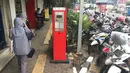 Kondisi mesin parkir yang tidak berfungsi di Jalan Sabang, Jakarta, Jumat (15/12). Karena berakhirnya kontrak dengan pengelola mesin parkir, penarikan biaya parkir di 3 wilayah di Jakarta kembali dilakukan secara manual. (Liputan6.com/Immanuel Antonius)