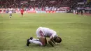<p>Selebrasi pemain Arema FC, Gustavo Almeida Dos Santos, setelah mencetak gol ke gawang Persija Jakarta dalam pertandingan pekan kesembilan BRI Liga 1 2023/2024 yang berlangsung di Stadion Patriot Candra Bhaga, Bekasi, Minggu (20/9/2023). (Bola.com/Bagaskara Lazuardi)</p>
