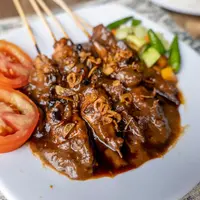 ilustrasi sate ayam/Adhitya Krisna/Shutterstock
