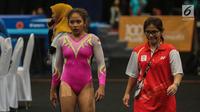 Pesenam putri Rifda Irfanaluthfi usai berlaga pada nomor senam lantai di SEA GAMES 2017 Kuala Lumpur, Rabu (23/8). Rifda meraih perunggu di nomor senam lantai dan medali emas ke-13 untuk Indonesia di nomor balok keseimbangan. (Liputan6.com/Faizal Fanani)