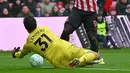 Pada pertandingan itu, Lammens tercatat membuat empat kali penyelamatan gemilang untuk Manchester United. (AFP/Andy Buchanan)