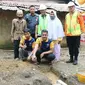 Peletakan batu pertama rumah layak huni yang ikut dibantu pembangunannya oleh warga binaan Lapas Teluk Kuantan, Kabupaten Kuansing.