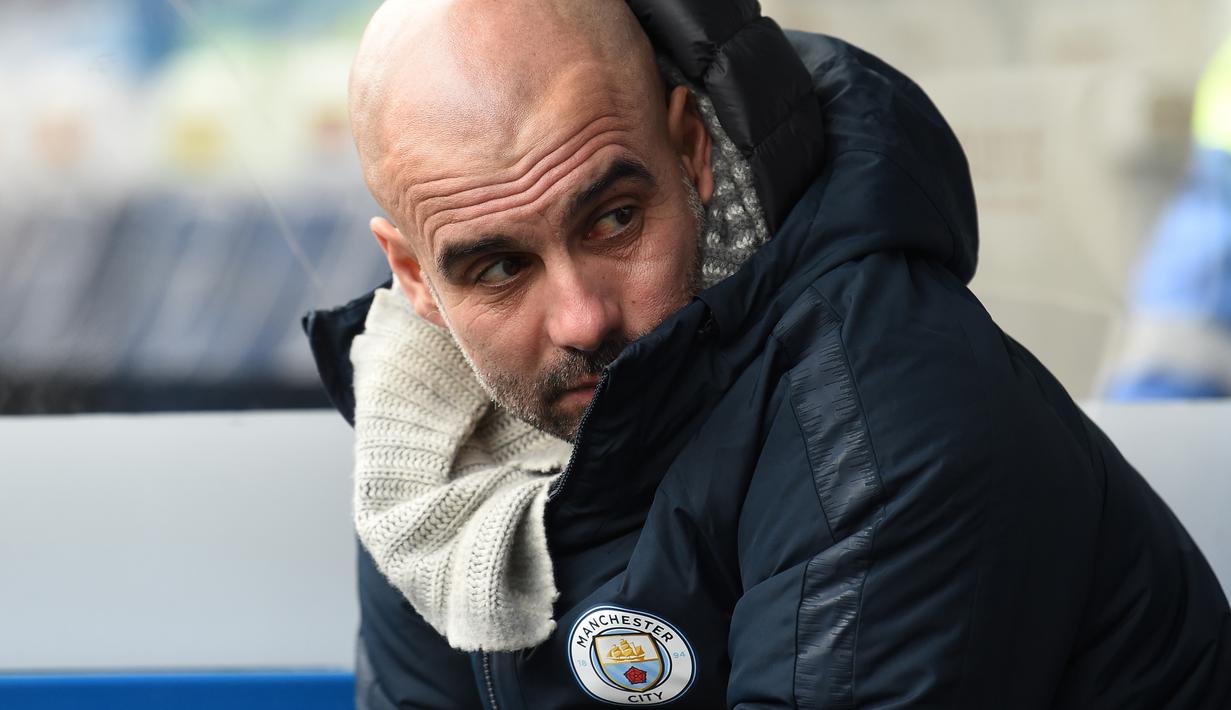 Pep Guardiola merasa Manchester City tampil buruk pada laga lanjutan Premier League yang berlangsung di stadion John Smith, Huddersfield, Minggu (20/1). Manchester City menang 3-0 atas Huddersfield. (AFP/Paul Ellis)