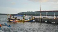 Perahu nelayan berlabuh di TPI PPSC Cilacap. (Foto: Liputan6.com/Muhamad Ridlo)