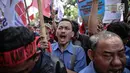 Sejumlah massa menggelar aksi unjuk rasa di depan kantor Kementerian BUMN, Jakarta, Senin (31/7). Dalam aksinya mereka  menuntut evaluasi Kementerian BUMN terkait adanya potensi kerugian negara. (Liputan6.com/Faizal Fanani)