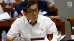 Menteri Hukum dan HAM Yasonna Laoly saat mengikuti rapat kerja dengan Komisi III DPR, di Kompleks Parlemen Senayan, Jakarta, Kamis (13/6). Raker membahas pendahuluan RKA-KL dan Rencana Kerja Pemerintah (RKP) Kementerian Hukum dan HAM tahun 2020. (Liputan6.com/Johan Tallo)