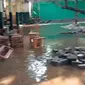 SDN Sukamanah 02 di Jalan Manduhur, Desa Sukamanah, Kecamatan Jonggol, Kabupaten Bogor terendam banjir. (Foto:Liputan6/Achmad Sudarno)