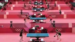 Para pemain tenis meja melakukan sesi latihan jelang Olimpiade Tokyo 2020 di Tokyo Metropolitan Gymnasium, Tokyo, Jepang, Rabu (21/7/2021). Olimpiade Tokyo 2020 akan dibuka pada 23 Juli 2021. (Jung Yeon-je/AFP)