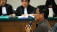 Sesmenpora Wafid Muharram hadir sebagai saksi di Pengadilan Tipikor Jakarta, Senin (5/5/2014) (Liputan6.com/Miftahul Hayat).