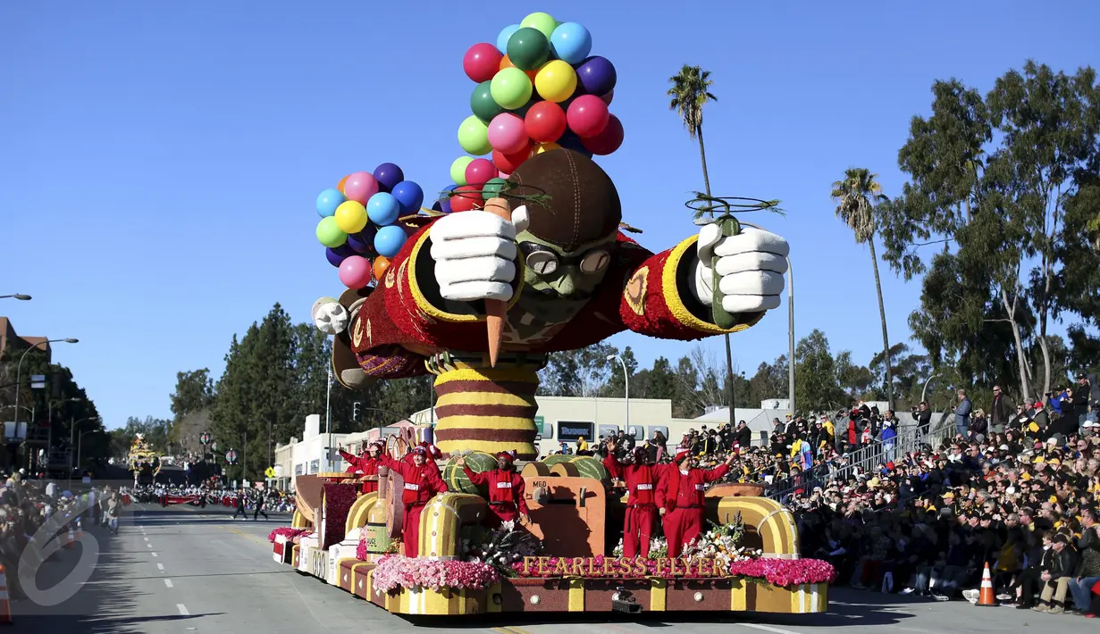 Sebuah mobil hias berbentuk pilot terbang ikut berparisipasi di Rose Parade, Pasadena, California (1/1/2016). Acara Rose Parade menjadi acara yang dinantikan penduduk Pasadena setiap awal tahun (REUTERS / David McNew)