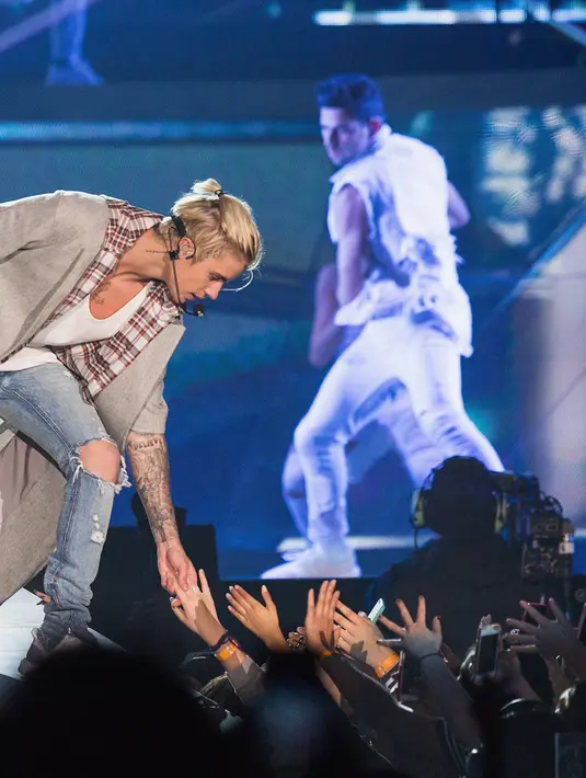 Mempunyai segudang jadwal tur dunia pada album 'Purpose' serta aktivitas yang sangat banyak menjadikan Justin Bieber jatuh sakit dan kelelahan. (AFP/Bintang.com)