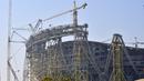 Suasana pembangunan Stadion Lusail di Qatar, Jumat (20/12). Lusail akan menjadi stadion untuk partai pembuka dan penutup piala dunia 2022 di Qatar. (AFP/Giuseppe Cacace)
