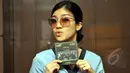 Suci Idol saat menghadiri konferensi pers peluncuran singgle pertama dari grup musik FIRE (First Idol REunion), Jakarta, Jumat (23/1/2015). (Liputan6.com/Panji Diksana)