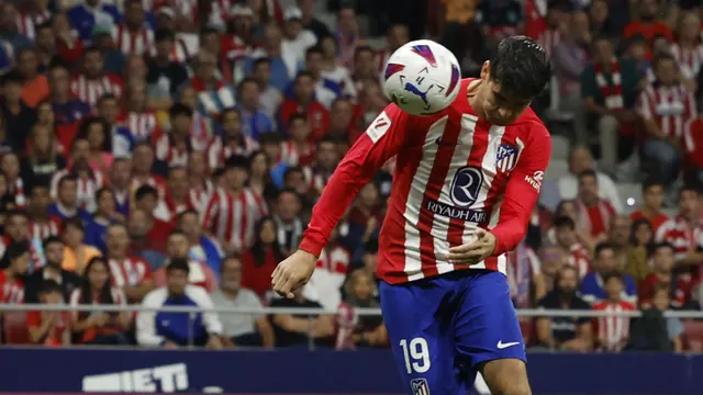 Foto: Sundulan Alvaro Morata dan Antoine Griezmann Bungkam Real Madrid di El Derbi Madrileno