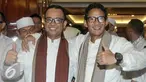 Anies Rasyid Baswedan dan Sandiaga Salahuddin Uno saat berada di kediaman orang tua Ketua Umum Gerindra, Prabowo Subianto, Jakarta, Jumat (23/9).  (Liputan6.com/Yoppy Renato)