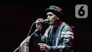 Aksi panggung Glenn Fredly dalam festival musik Love Fest di Istora Senayan, Jakarta, pada 22 Februari 2020. Salah satu penyanyi kebanggaan Indonesia, Glenn Fredly meninggal dunia, Rabu (8/4/2020) malam dalam usia 44 tahun di sebuah rumah sakit di Jakarta Selatan. (Liputan6.com/Faizal Fanani)