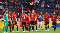 Para pemain Urawa Reds saat bermain di Liga Champions Asia. (STR / JIJI Press / AFP)