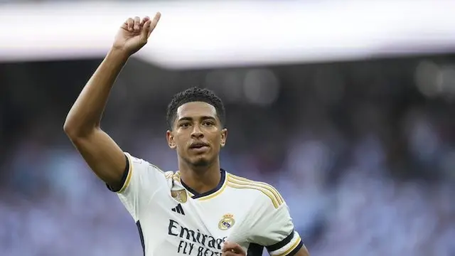 Jude Bellingham mencetak gol pada laga Real Madrid vs Osasuna di La Liga musim 2023/2024 (c) AP Photo/Jose Breton