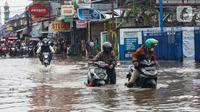 Banjir juga disebabkan tingginya curah hujan sejak beberapa hari yang lalu di kawasan tersebut. (Liputan6.com/Angga Yuniar)