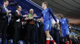 Antoine Griezmann dipilih oleh 13 panel teknik UEFA yang didalamnya termasuk Sir Alex Ferguson, David Moyess selama turnamen piala Eropa 2016 di Prancis. (10/7/2016). (AFP/POOL/Kamil Zihnioglu)