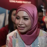 Rossa saat tampil berhijab di sebuah acara. Selain cantik, Rossa memiliki kepedulian tinggi terhadap sesama. (Galih W. Satria/Bintang.com)
