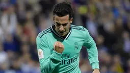 Penyerang Real Madrid, Lucas Vazquez berselebrasi usai mencetak gol ke gawang Real Zaragoza pada pertandingan Copa del Rey (Piala Raja) di stadion La Romareda di Zaragoza (29/1/2020). Real Madrid melaju mantap ke perempatfinal Copa del Rey setelah mengalahkan Zaragoza 4-0. (AFP Photo/Jose Jordan)