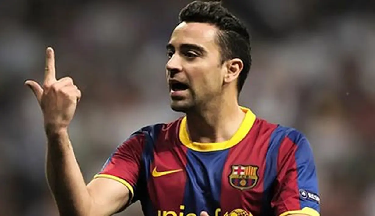 Gelandang Barcelona Xavi Hernandez pada pertemuan pertama kontra Real Madrid di babak semifinal Liga Champions pada 27 April 2011 di Santiago Bernabeu. AFP PHOTO/DANI POZO