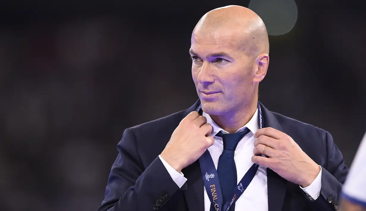 Di Liga Champions format modern, belum ada satu pelatih pun yang mampu membawa klub jadi juara secara beruntun. Zidane memecahkan mitos tersebut dengan mengalahkan Juventus saat Final Liga Champion 2016/17 di Cardiff. (AFP Photo)