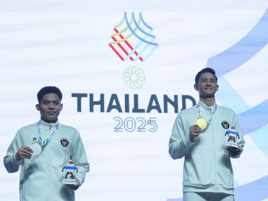 Tunggal putra Indonesia berjaya di SEA Games 2025. Alwi Farhan berhasil meraih medali emas sementara rekan senegara Moh. Zaki Ubaidillah harus puas denga torehan medali perak. (Bola.com/Bagaskara Lazuardi)