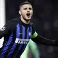 Striker Inter Milan, Mauro Icardi, melakukan selebrasi usai membobol gawang PSV Eindhoven pada laga Liga Champions di Stadion San Siro, Italia, Selasa (11/12). Kedua tim bermain imbang 1-1. (AP/Luca Bruno)