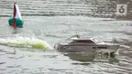 Kontes Kapal Cepat Tak Berawak Nasional (KKCTBN) digelar di Danau Kenanga, Kampus UI, Depok, Jawa Barat, Selasa (24/10/2023). Kontes ini diikuti 88 tim dari 33 perguruan tinggi seluruh Indonesia. (merdeka.com/Arie Basuki)