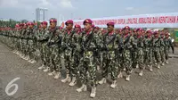 Prajurit TNI baris berbaris saat mengikuti apel gelar operasi penegak ketertiban (Ops Gaktib) di Silang Monas, Jakarta, Kamis (14/1). 1.244 prajurit mengikuti Operasi Yustisi dengan sandi Citra Wira Dharma 2016. (Liputan6.com/Gempur M Surya)