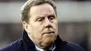 Manager of Tottenham Hotspurs Harry Redknapp awaits kick off against Fulham during a FA Cup fourth round football match at Craven Cottage in London, England, on January 30, 2011. AFP PHOTO/Ian Kington