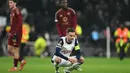 Menjamu AS Roma, Tottenham Hotspur gagal meraih poin penuh setelah bermain imbang 2-2. (JUSTIN TALLIS/AFP)