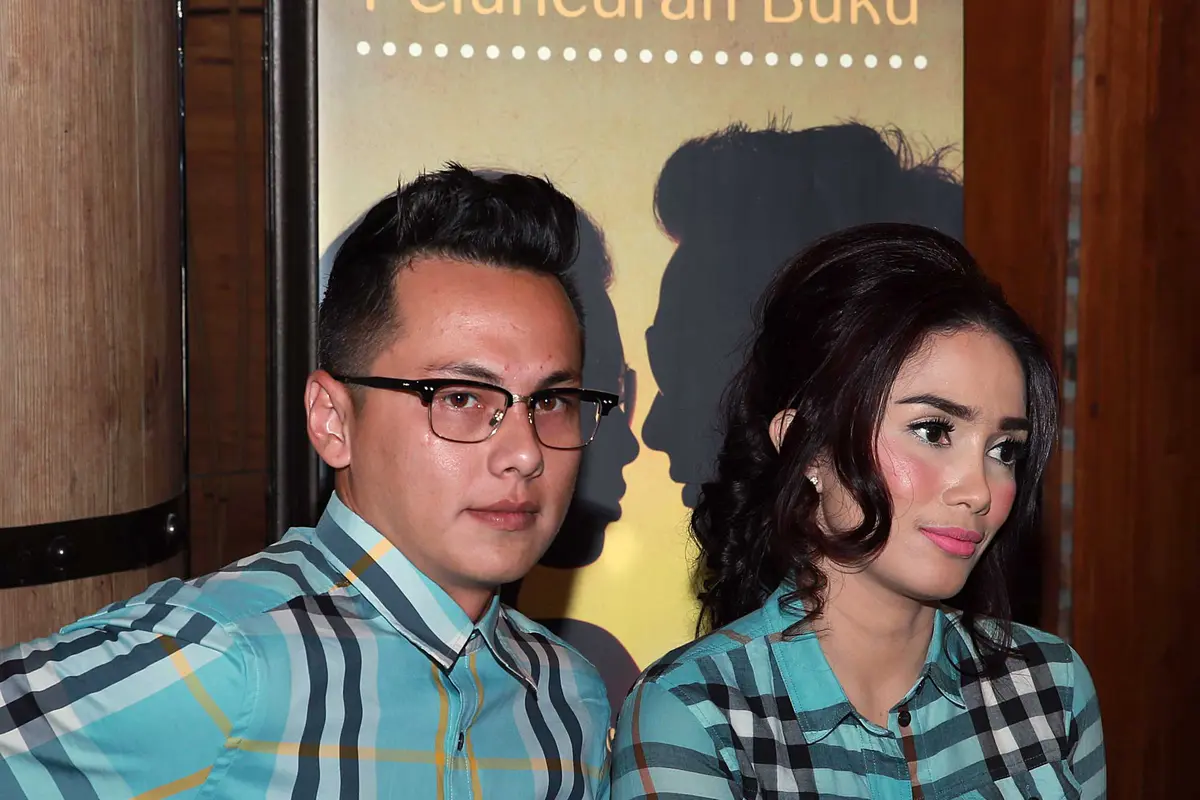 Ussy Sulistiawaty dan Andhika Pratama